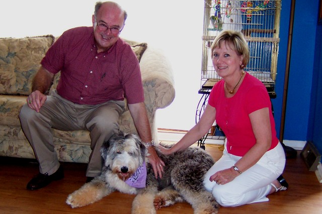 /images/dogs/6/Maggie with her new parents.jpg